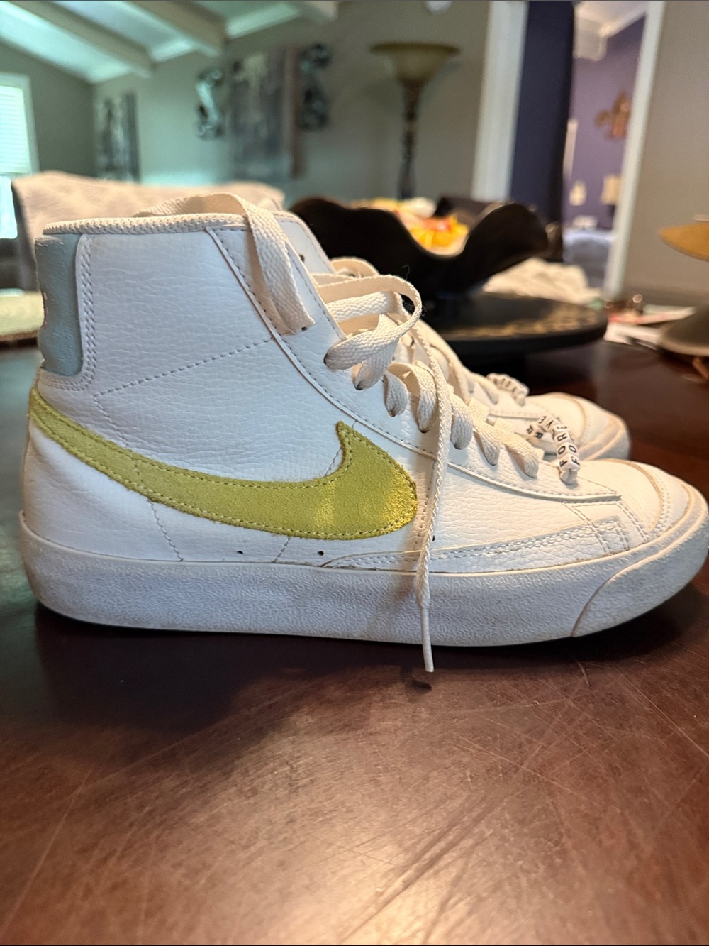 Nike White High-Top Sneakers with Yellow Swoosh